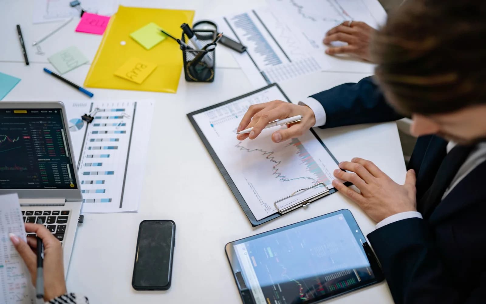 Editorial photograph: A Businessman Reviewing Business Analytics