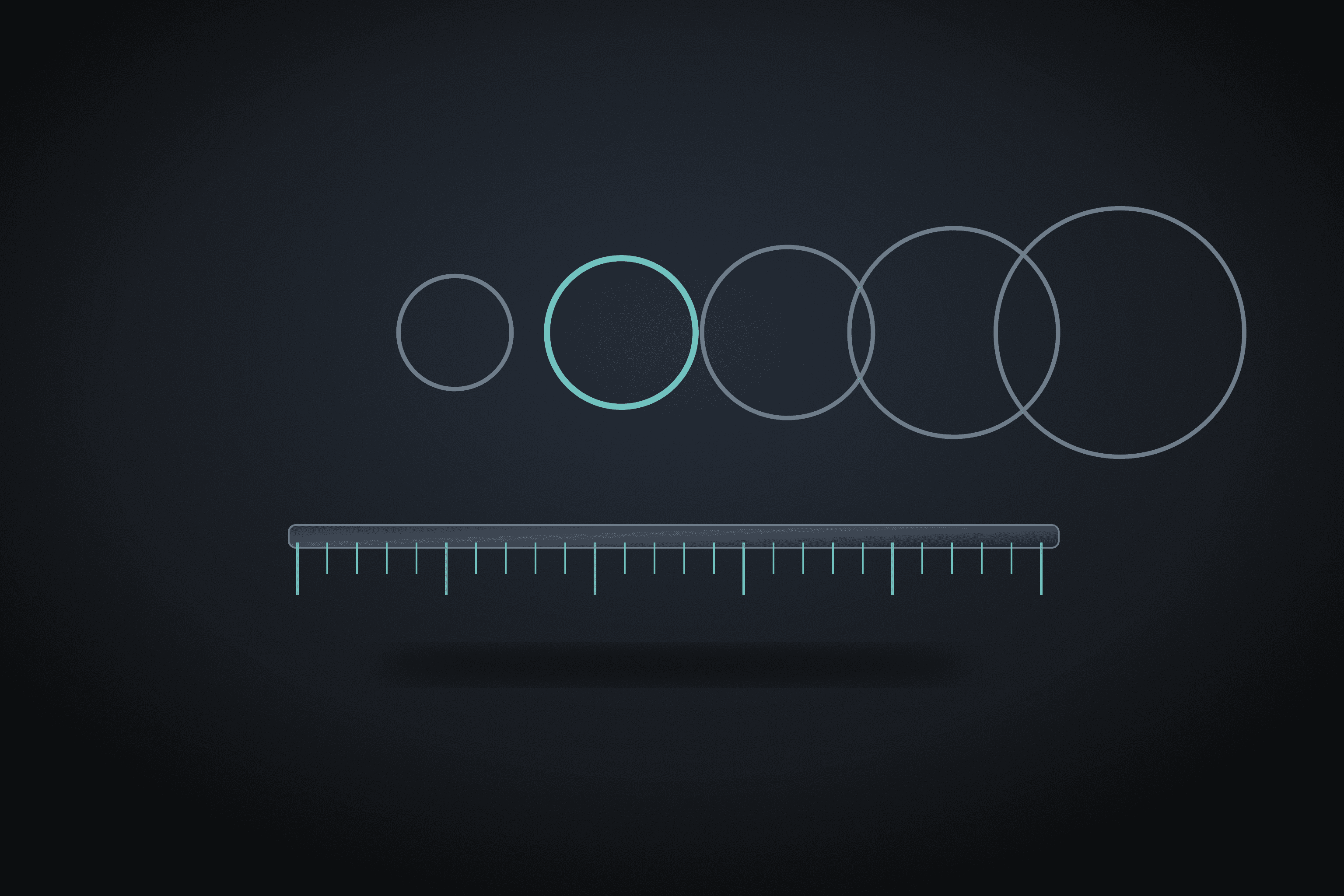 Row of rings of increasing size above a measuring ruler
