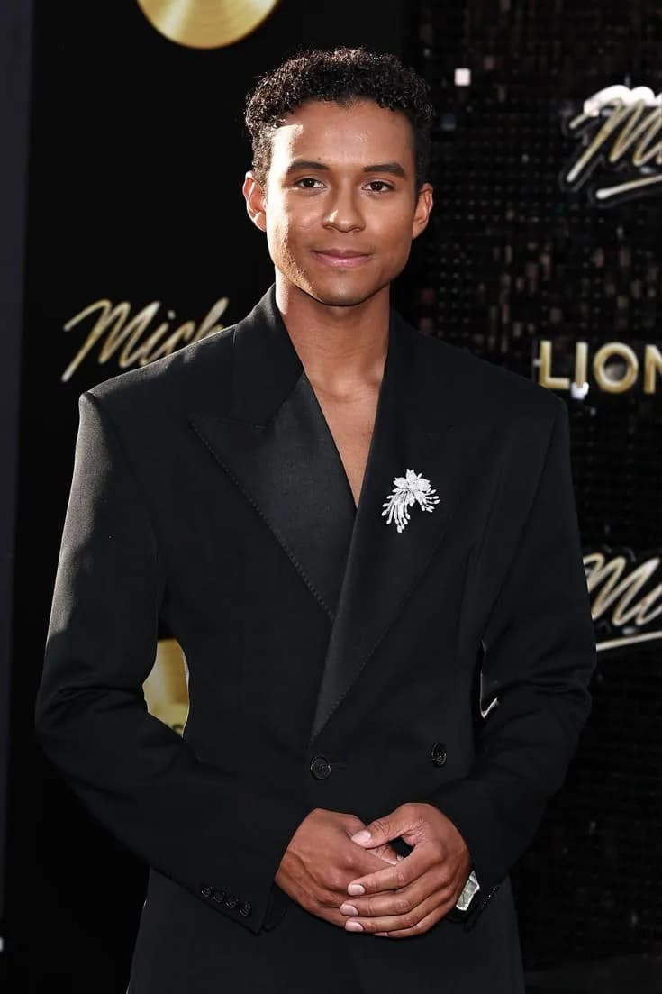 Portrait of actor and musician Jaafar Jackson in a black suit